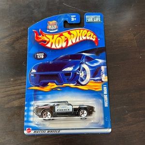 Hot Wheels 2002 Mainline #179 Mustang Mach 1 Black
BERMUDEZ County Police Car
